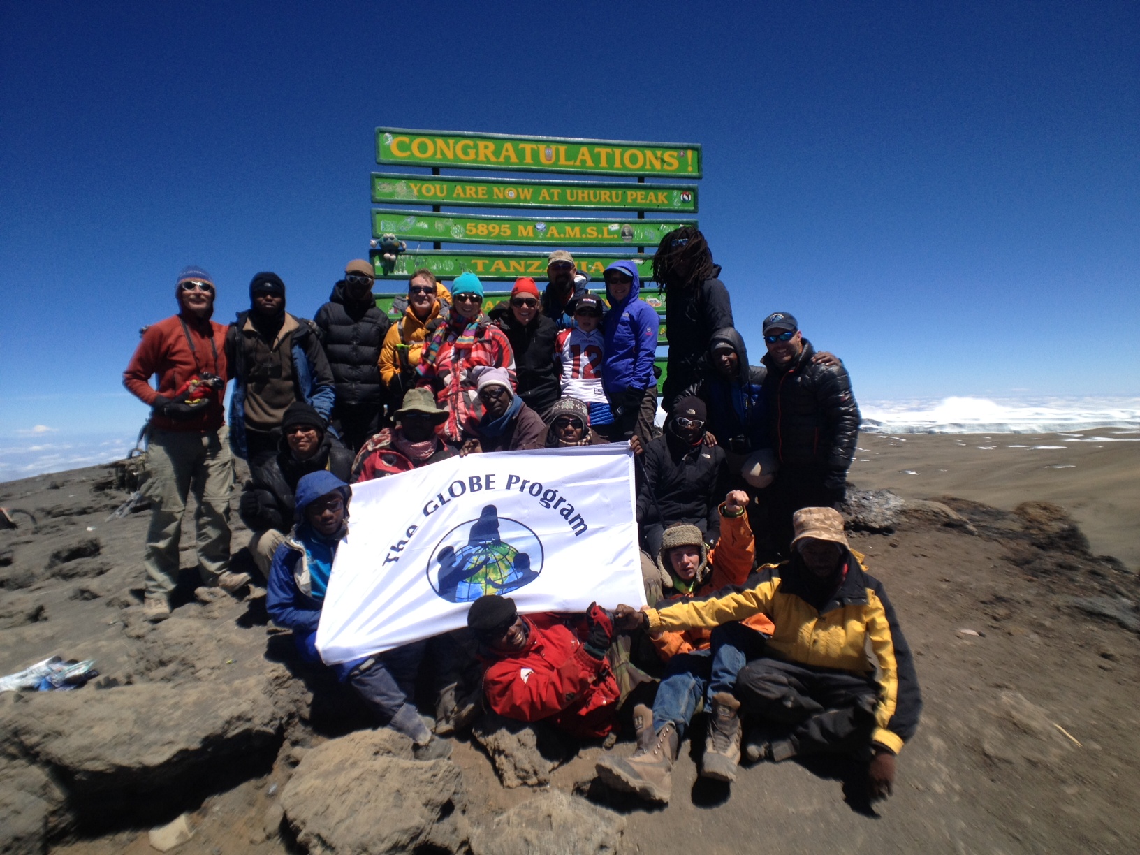 The team at the summit of Mt. Kilimanjaro
