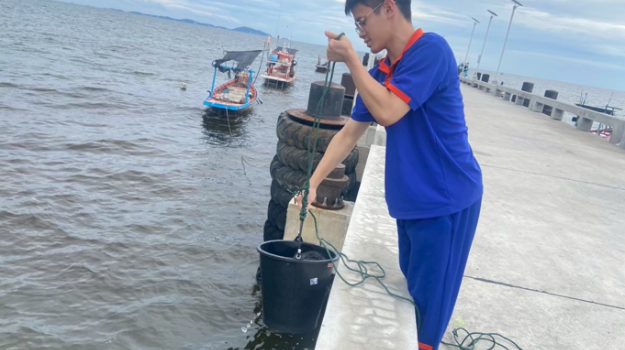 Students collecting water samples
