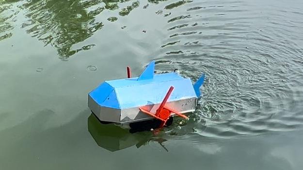 This image shows a wastewater treatment of Aquapurifier RoboFish in water source.