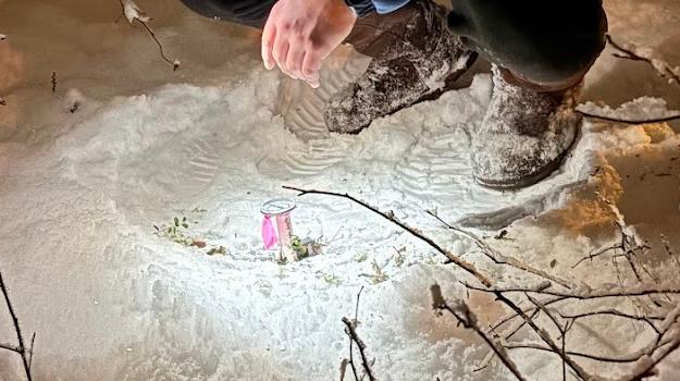 Dawson Baffrey collecting soil temperature data.