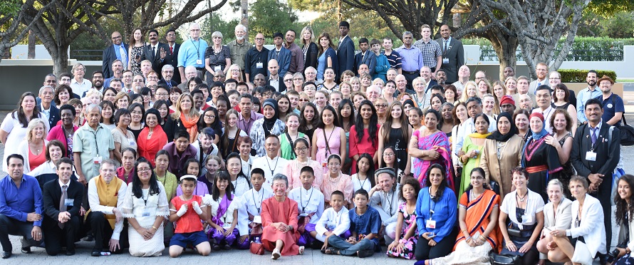 A large group pose for a photo.