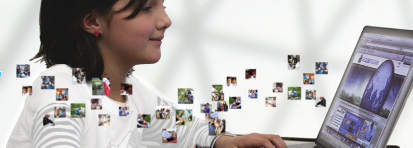 A girl looks at a computer showing GLOBE's website. Little images flutter by her from the screen.