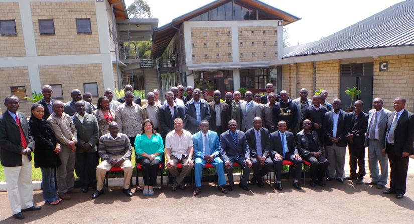 Several teachers pose for a group shot.