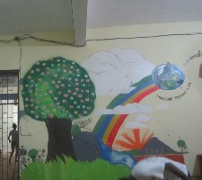 mural of trees, rainbow, globe logo
