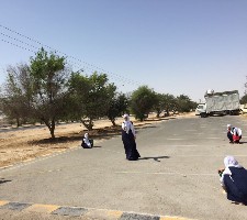 Pictures of female students collecting research data