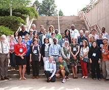 A smaller group poses for a photo.