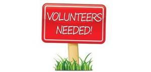 A red volunteers needed sign.