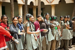 Girl students standing in line.