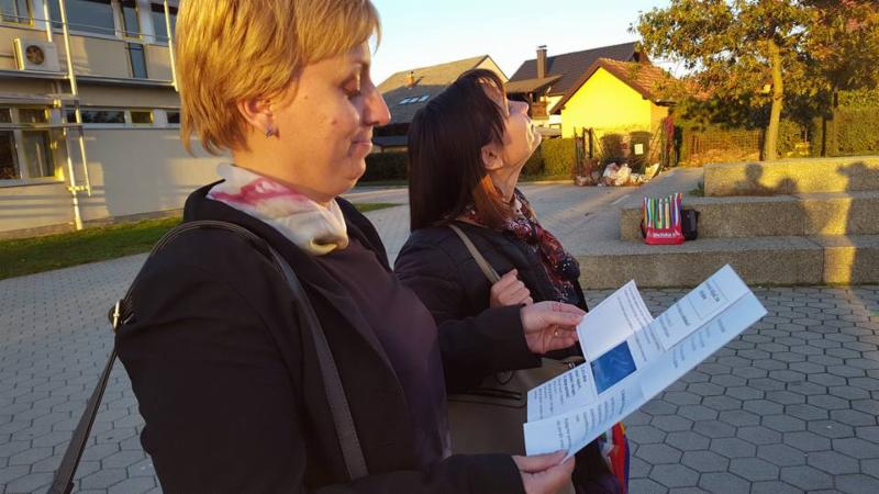 Women looking at the sky. 