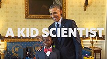 President Obama poses with a student at a science fair.