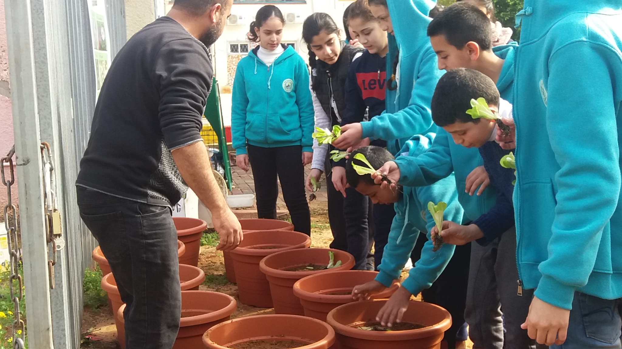 Jalil Nasra with his students