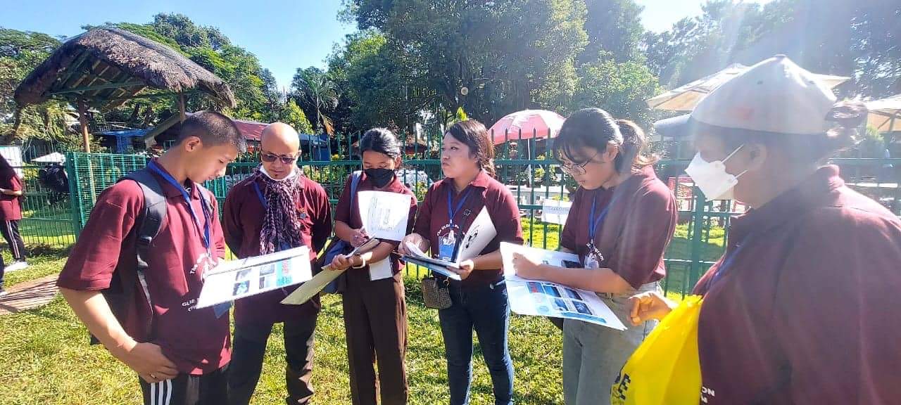 Participants studying clouds 