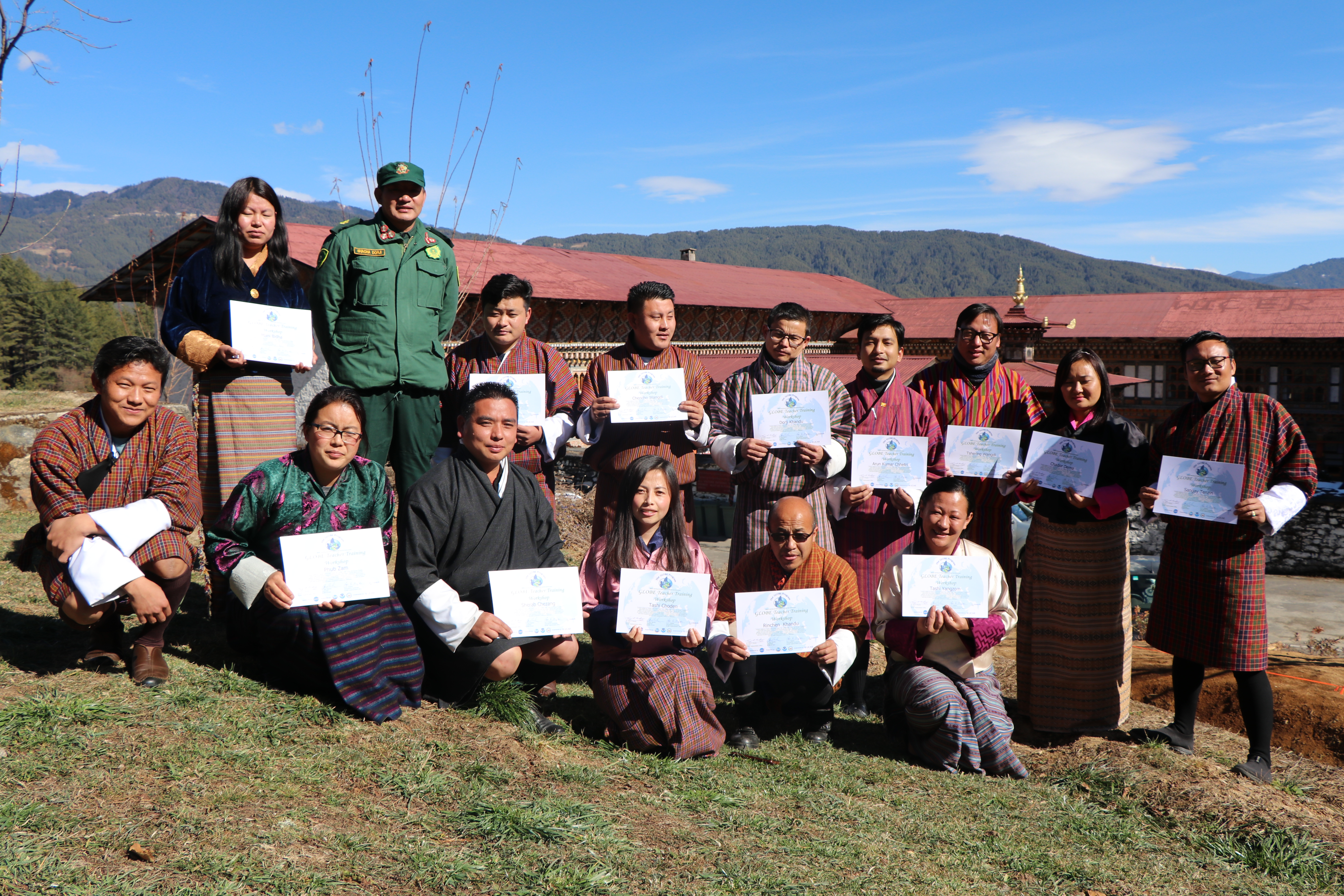 Director Shacha Dorji, Ugyen Wangchuck Institute for Conservation and Environment Research,   presenting teachers with GLOBE teacher training certificate  