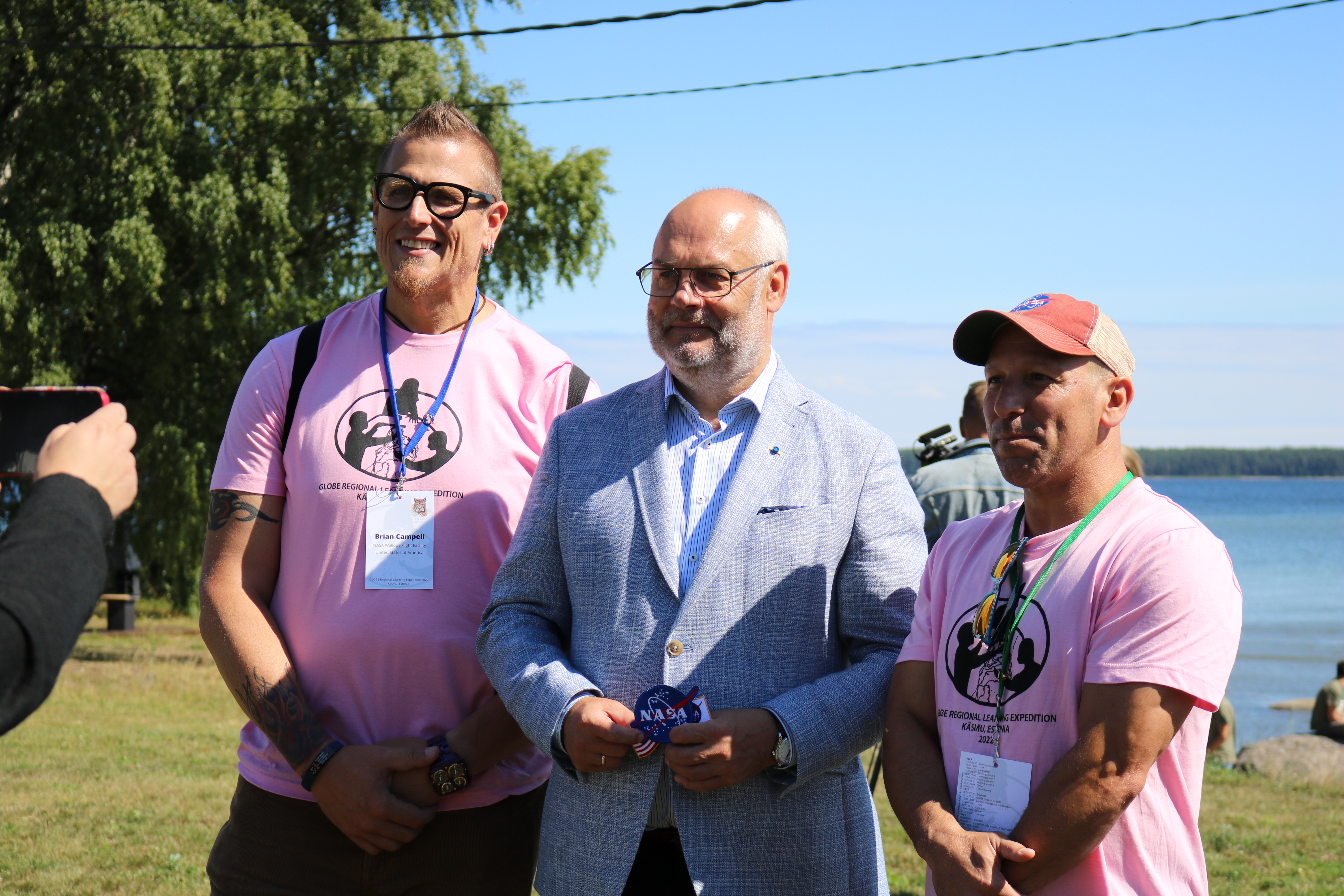 President of the Republic of Estonia, Alar Karis (middle); and NASA scientists Peter Falcon (right) and Brian Campbell (left)