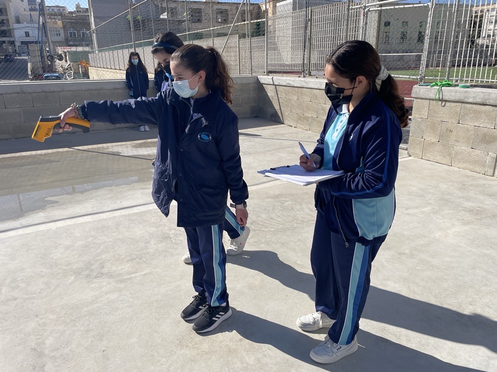 GLOBE students attending Gozo College Middle School measure concrete temperature