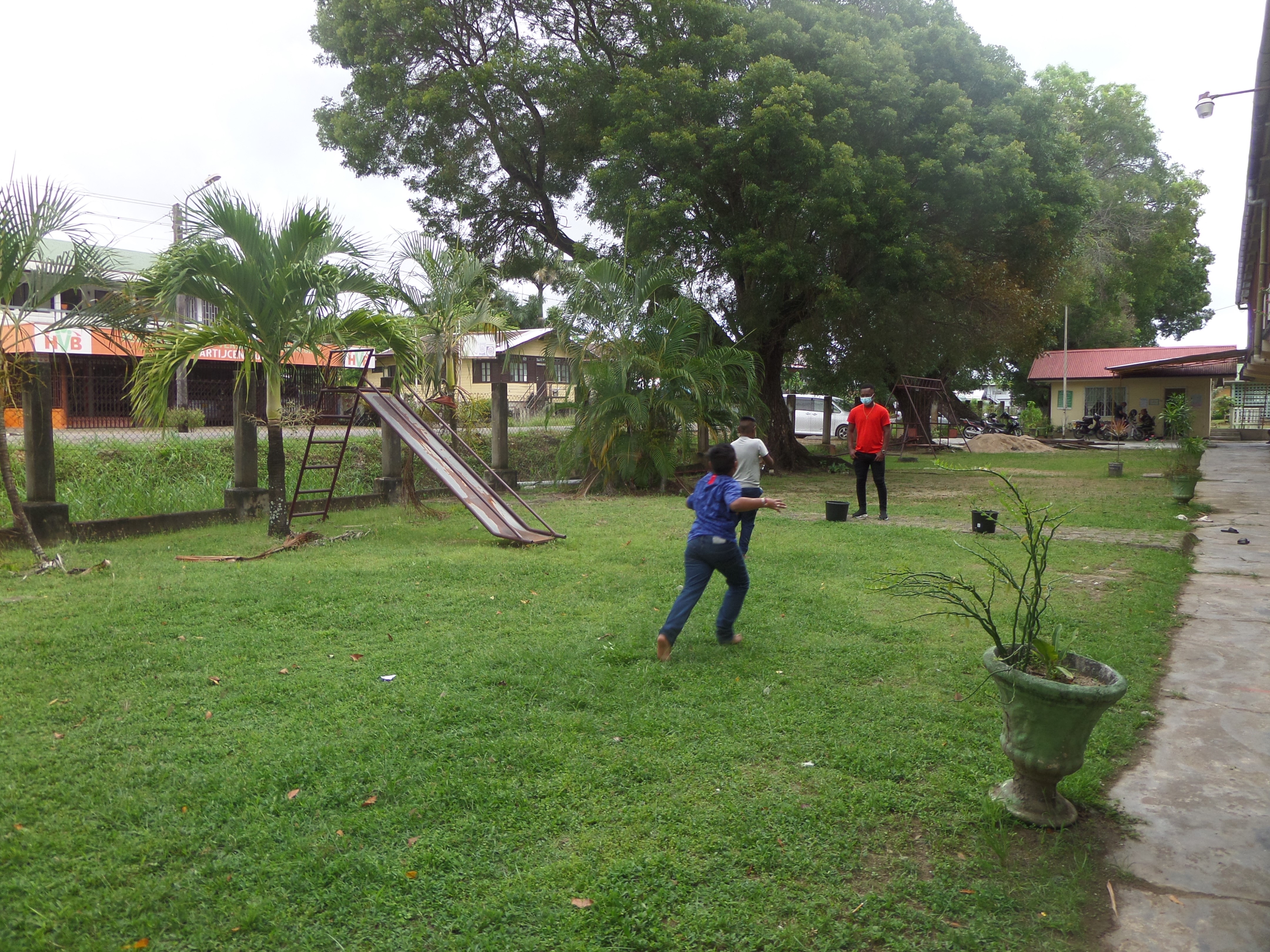 GLOBE Suriname students engaged in a summer vacation activity outside