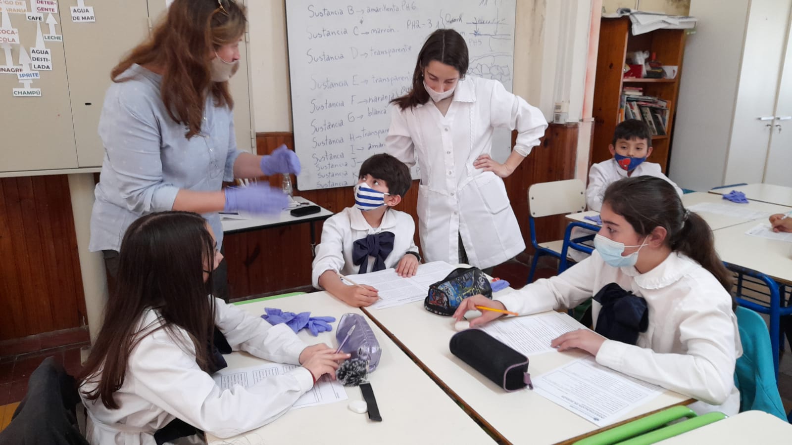 GLOBE students at School No. 168, Rincón del Colorado, Canelones, Uruguay; filling out soil data sheets