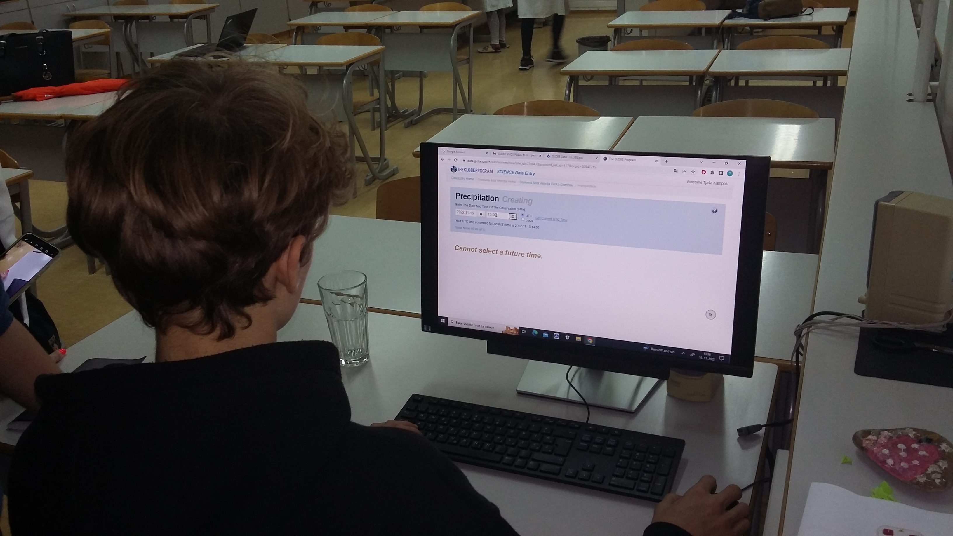 Student enters rainfall data in the GLOBE database at Primary School Venclja Perka, Slovenia.