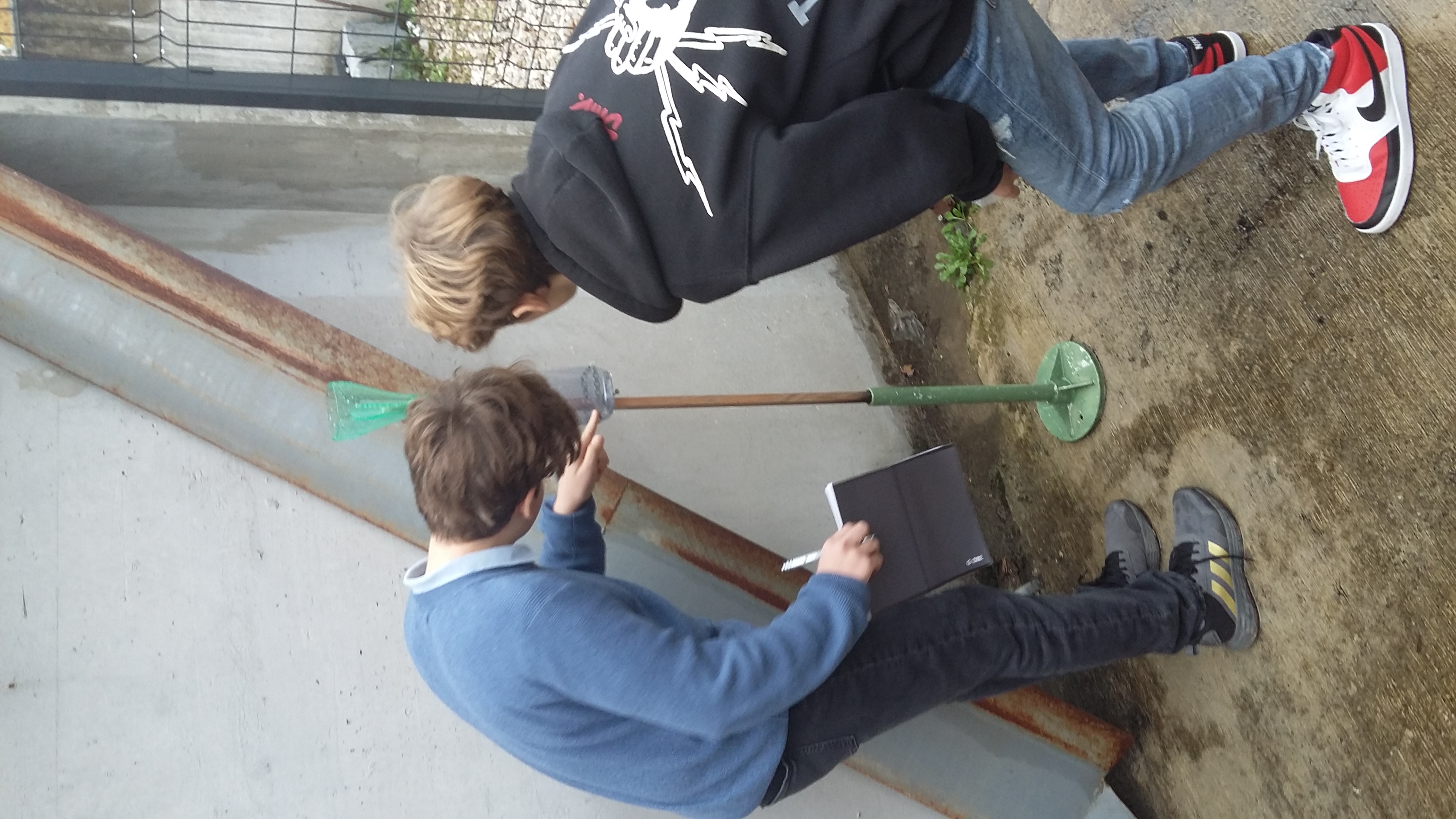 Students take rainfall measurements at Primary School Venclja Perka, Slovenia. 