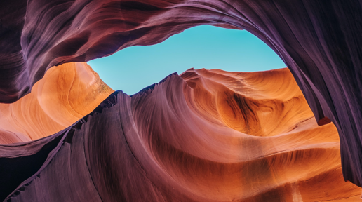 A photo of a swirling red rock canyon