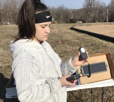 GLOBE student taking measurements