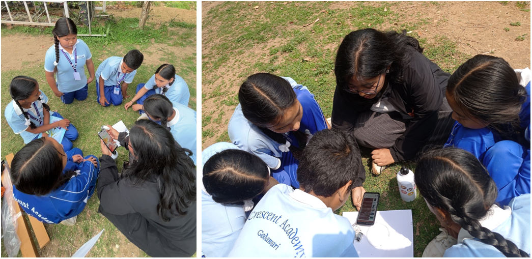 Facilitator and students outside using a mobile phone and other equipment.