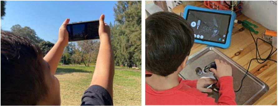 Child taking a photo of the sky outside. Child using a tablet and microscope.