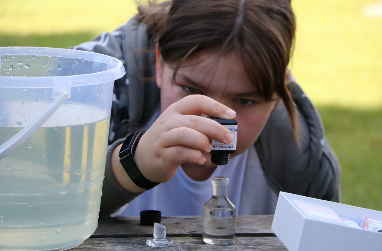 Photo of a GLOBE community member in scientific action.