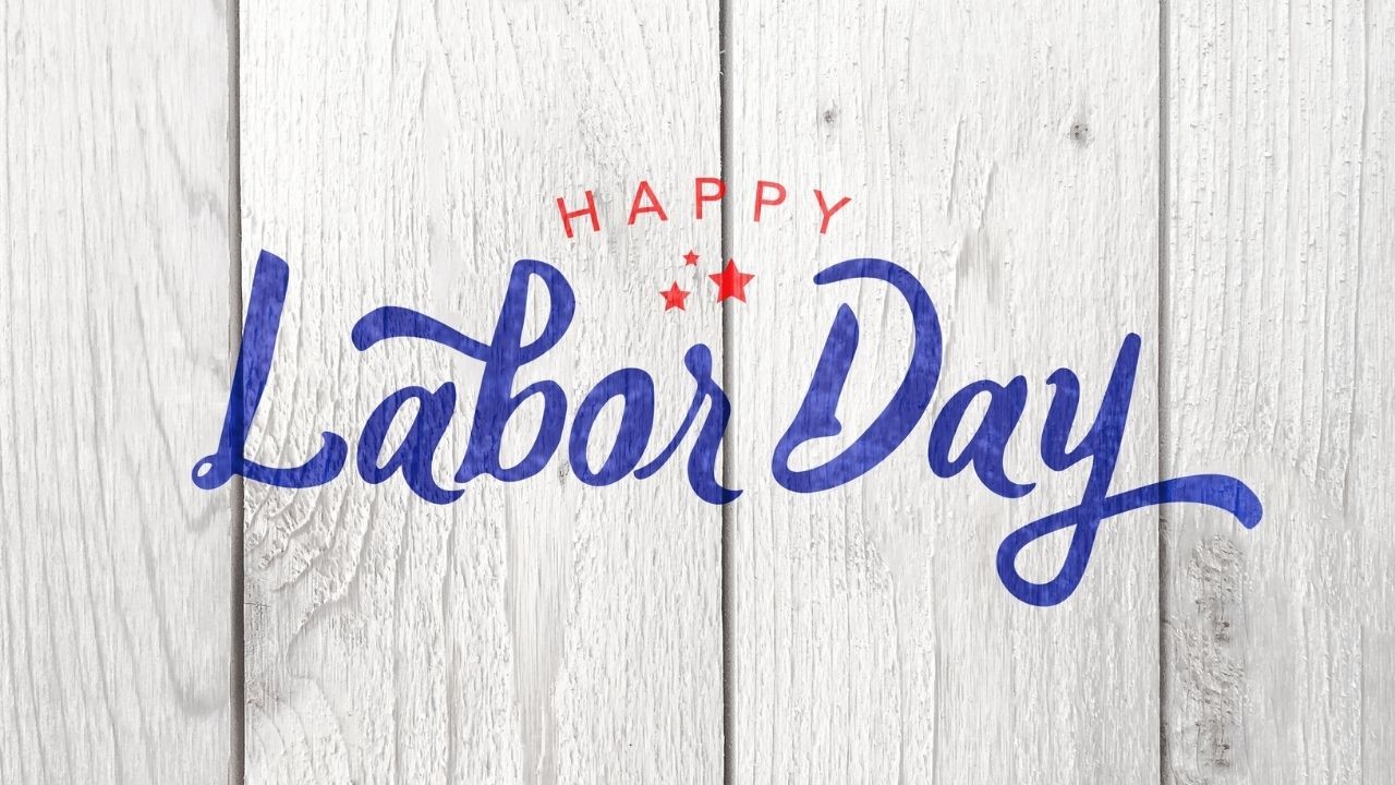 Photo of a wooden sign that reads, "Happy Labor Day"