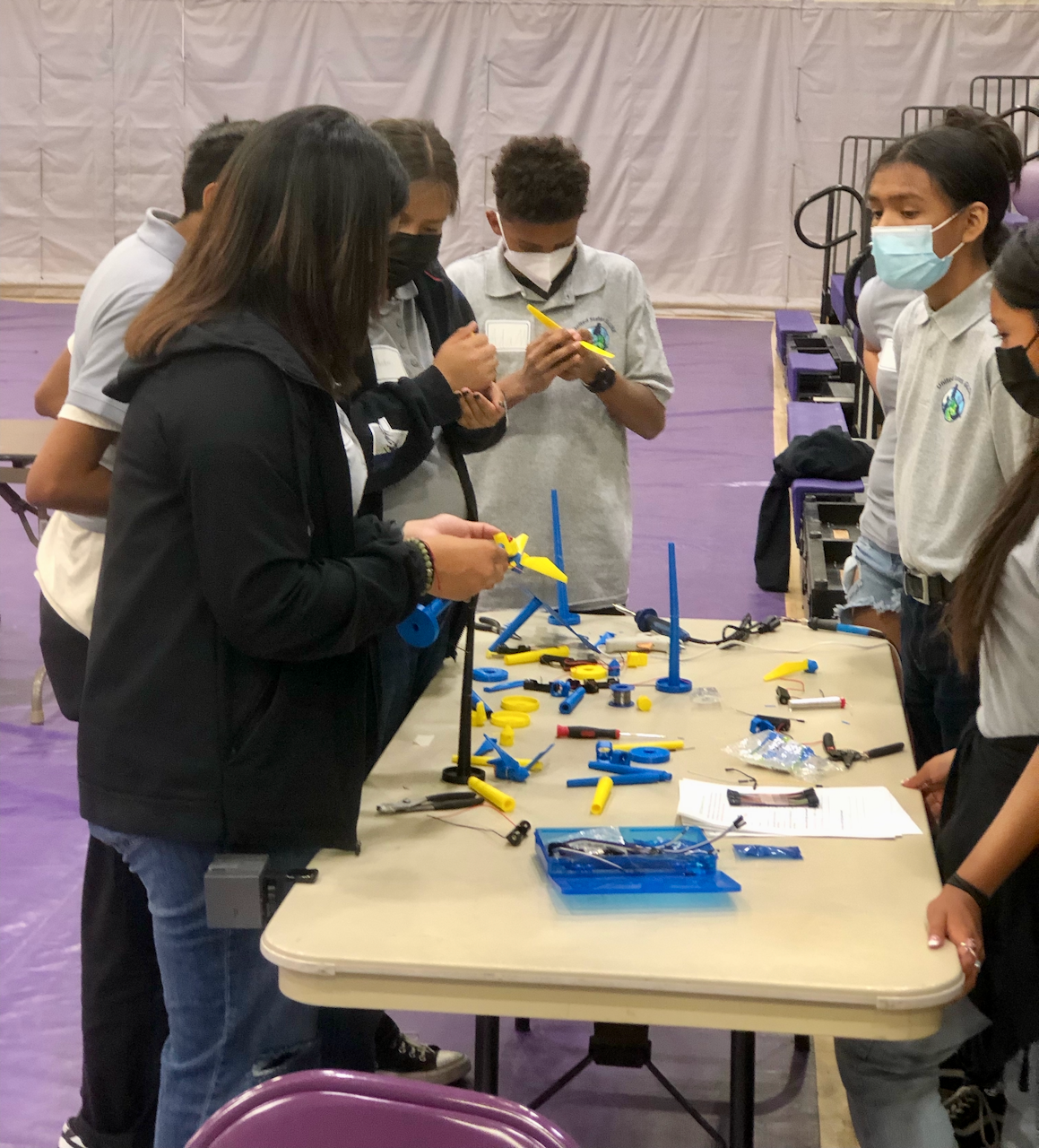 students build wind towers at the Mescalero Apache School student research symposium