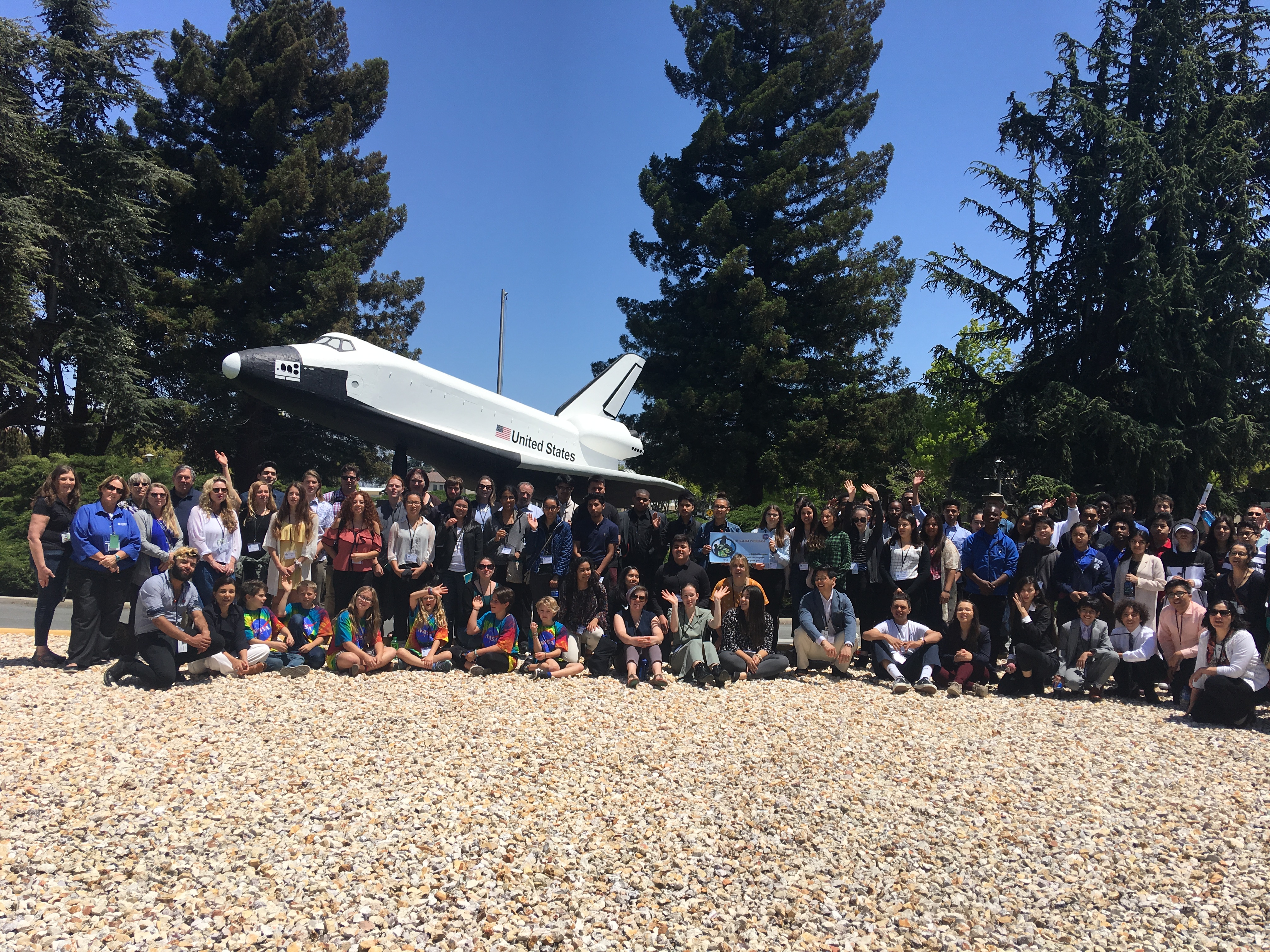 Group photo with NASA airplane at the Pacific SRS