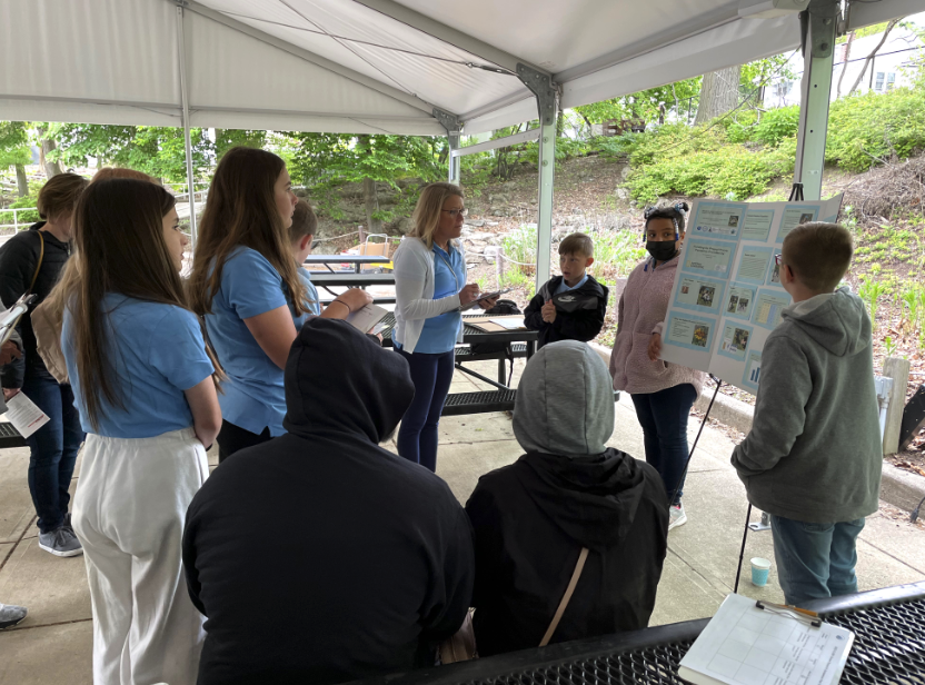 Students present to STEM professionals and peers at the SRS.