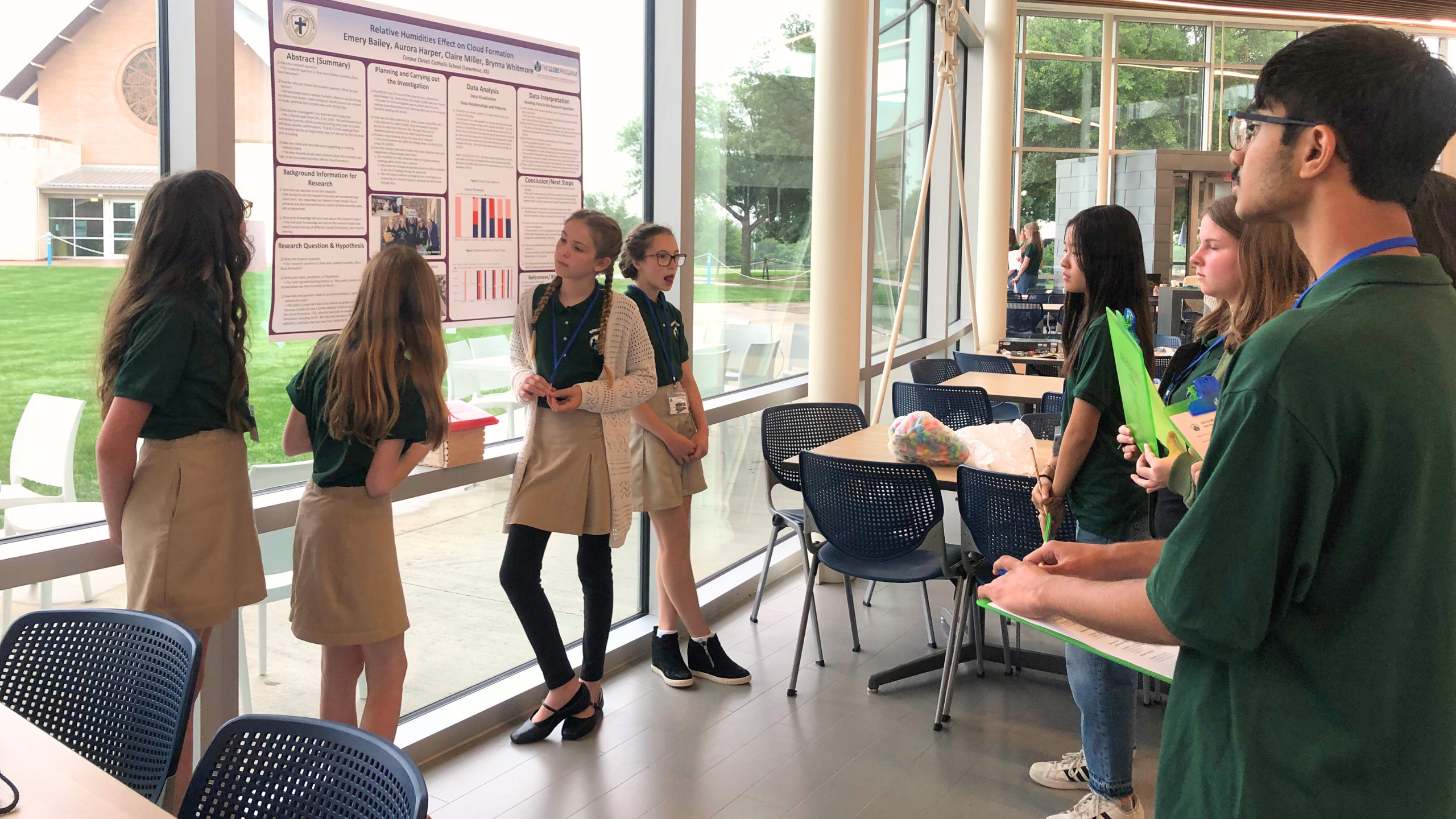 students present their research on Relative Humidities Effect on Cloud Formation to their peers at the Southwest Student Research Symposium