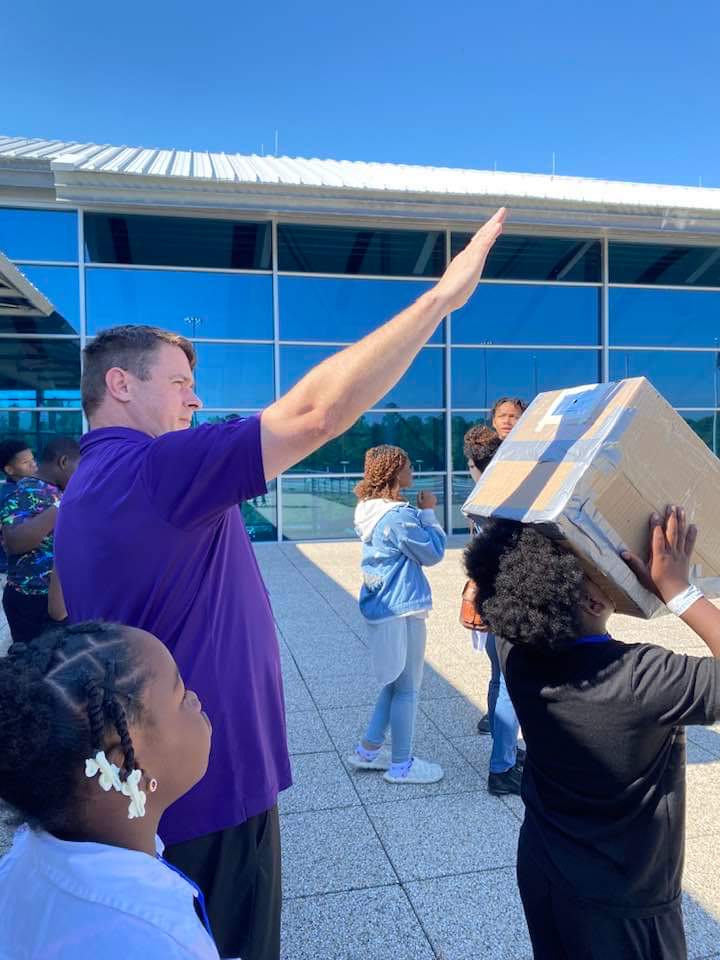 GLOBE Partner Christopher Sherman demonstrates one type of pinhole viewer for safe eclipse viewing