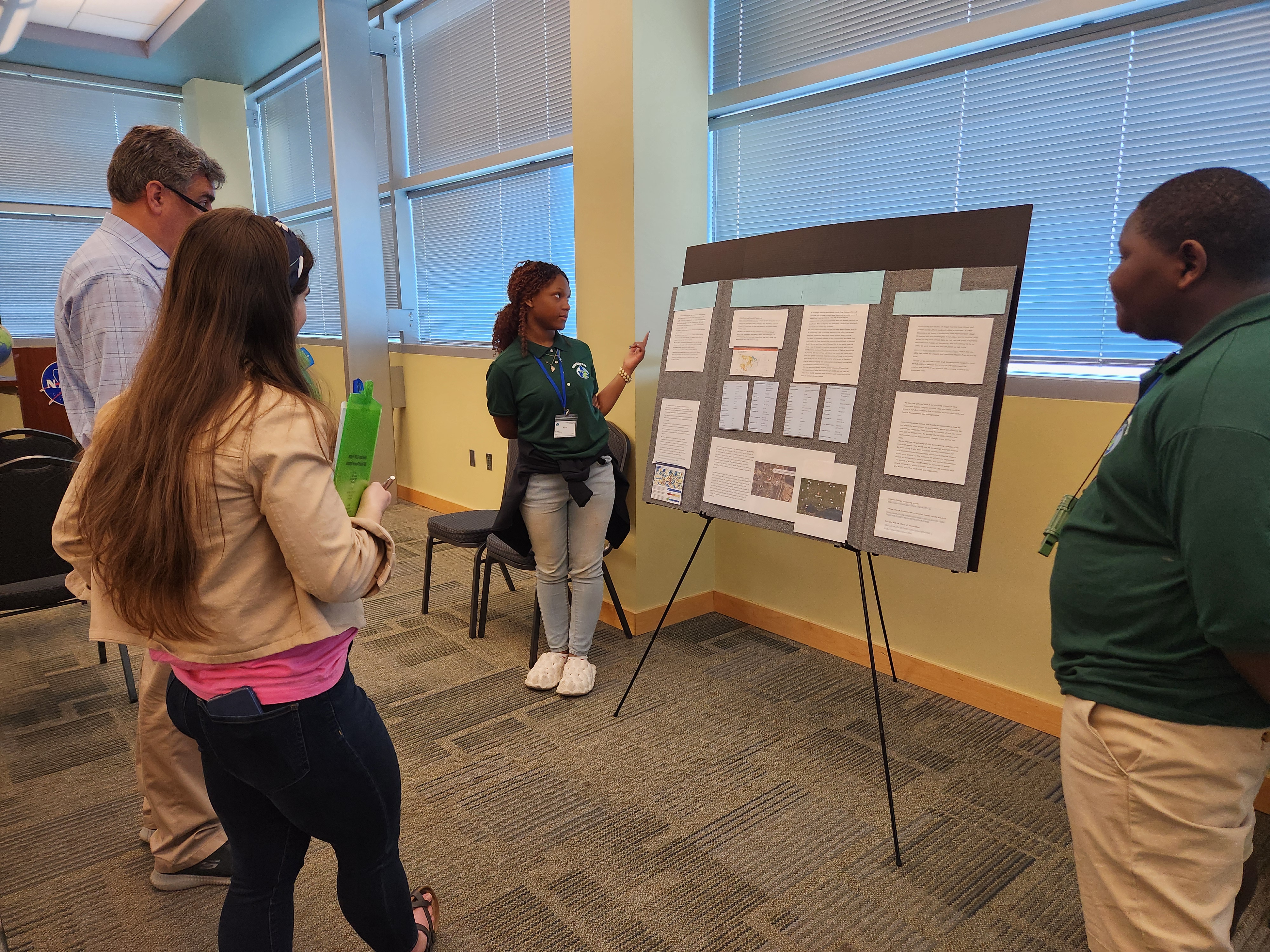 students present their GLOBE research to STEM professionals