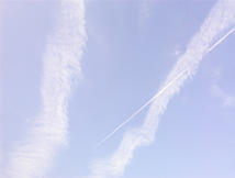 Old contrails with a new contrail forming