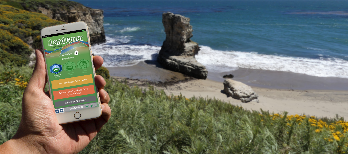 Hand holding device with GLOBE Observer Land Cover tool