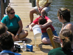 children doing science on water
