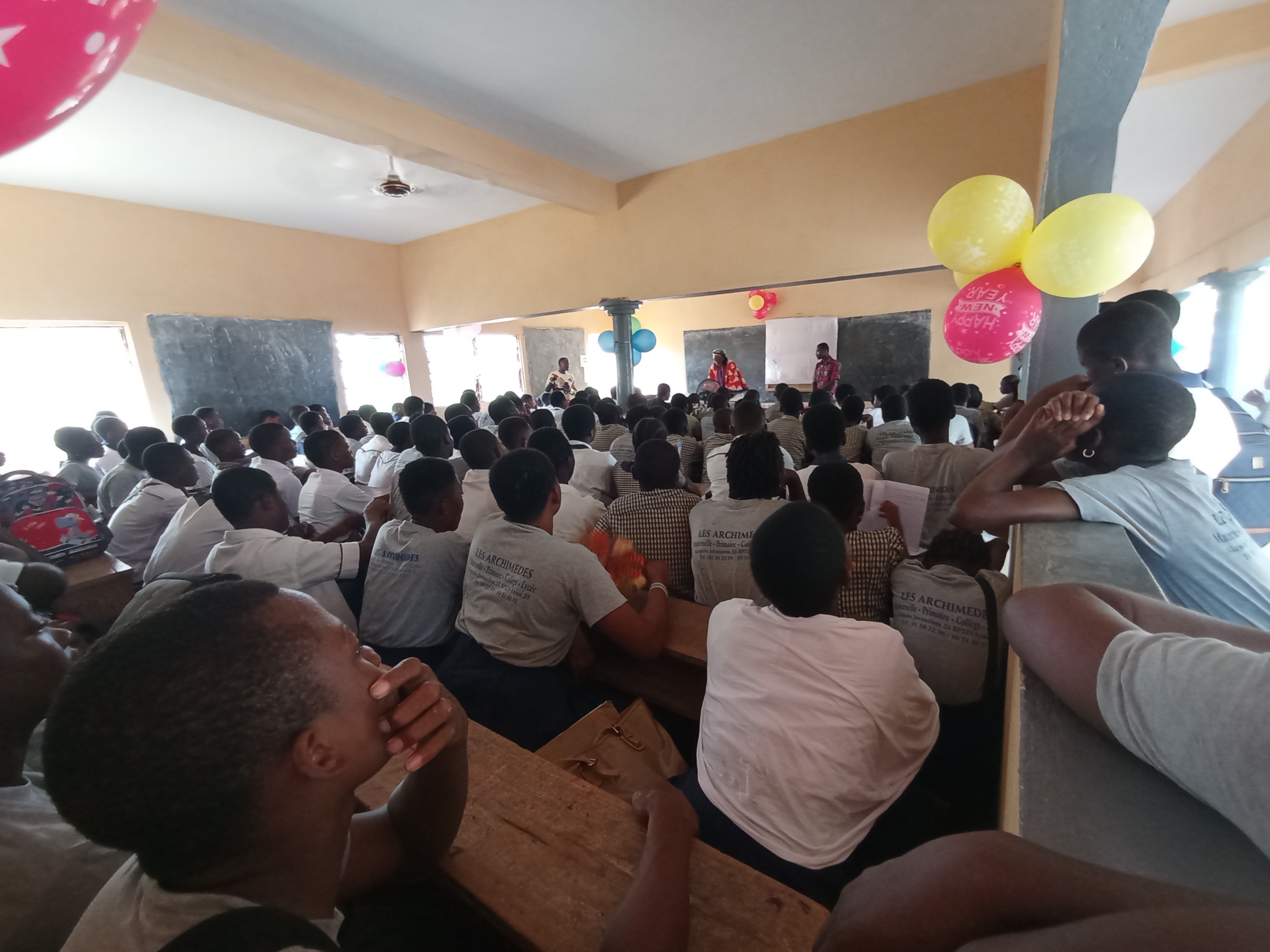 Crowd watching presentation.