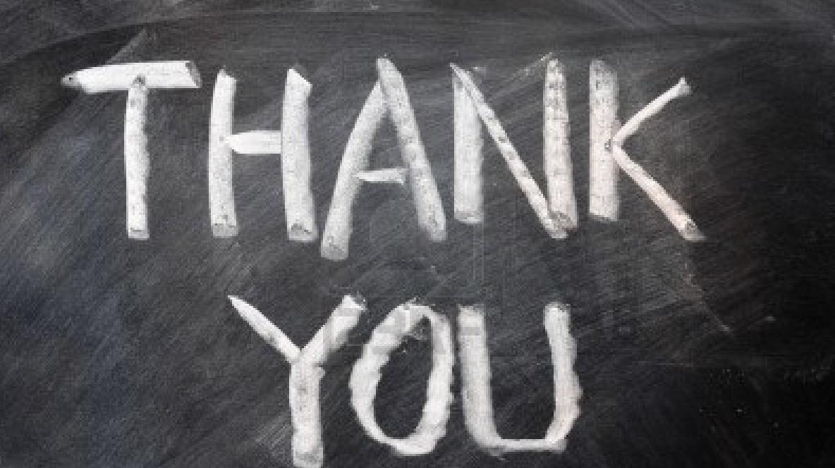 A photo of the words "Thank You" written on a chalkboard