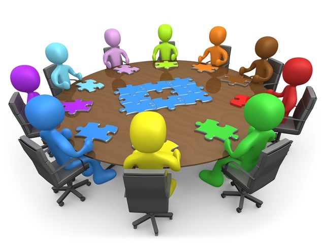   Graphic of a variety of people sitting at a table putting a puzzle together