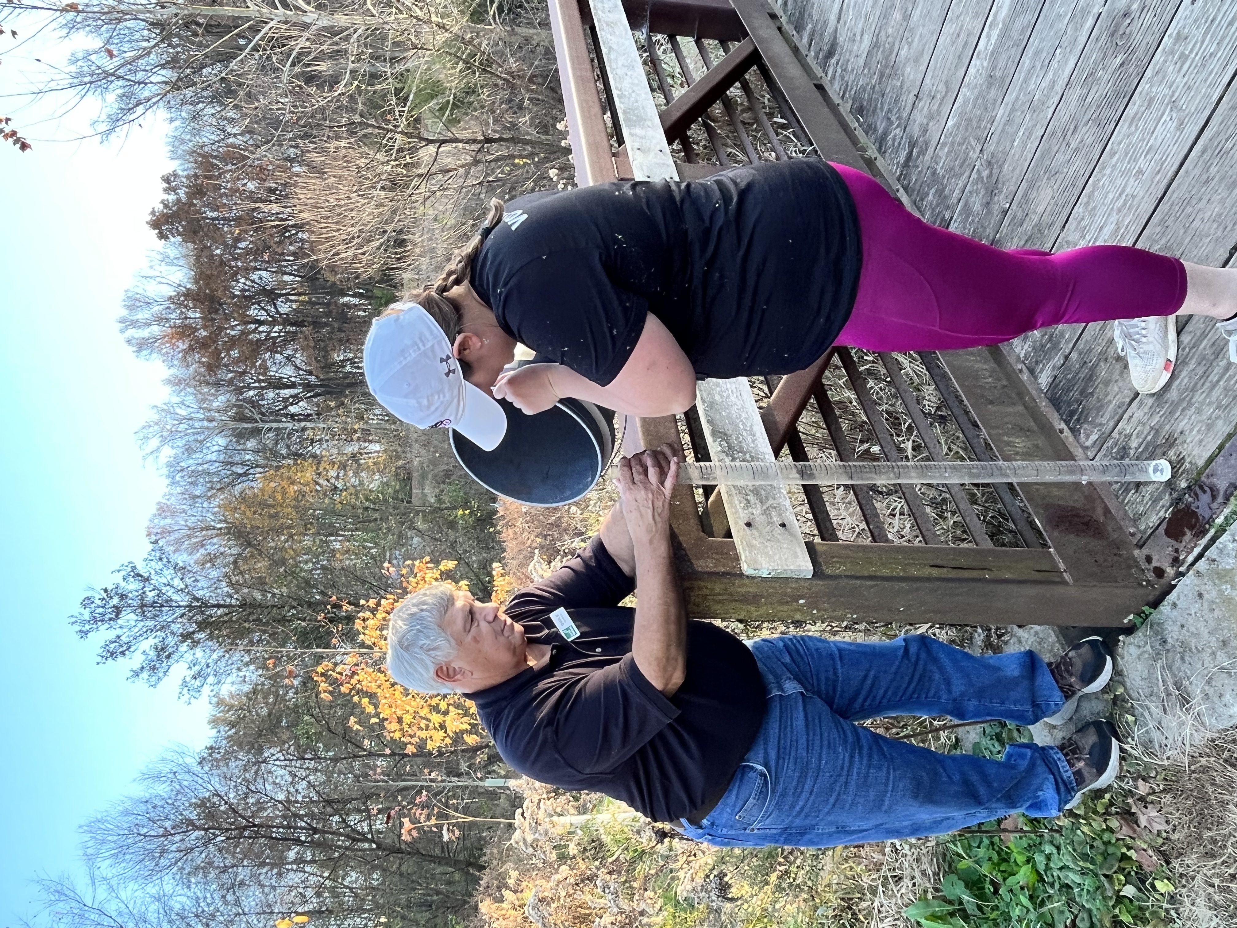 Two participants use a turbidity tube