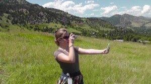 Student Scientist Emily capturing a land cover photo