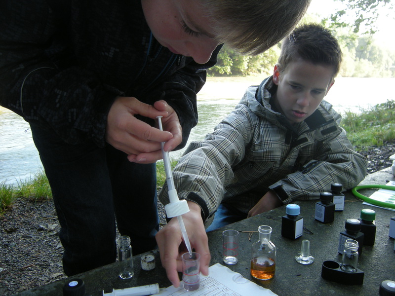 Students perform hydrology protocols alongside the Thur River near Uzwil, Switzerland