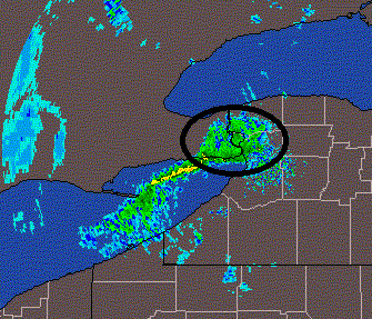 Lake effect rain event on the northern coast of Lake Erie which occurred in 1996.  Photo from NOAA.