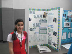 saeda in front of poster board