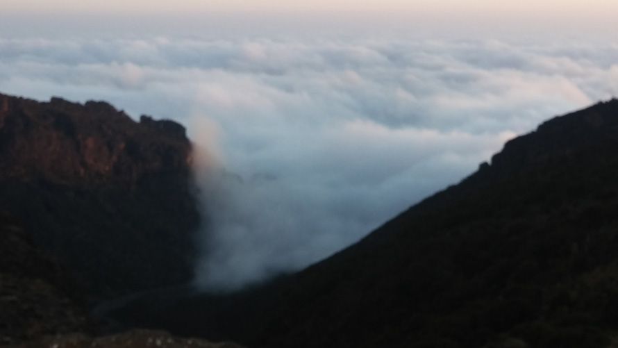 View of clouds from a mountain height.