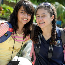 Two students smiling for the camera.