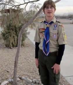 Boy scout posing