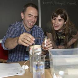 smiling people doing science